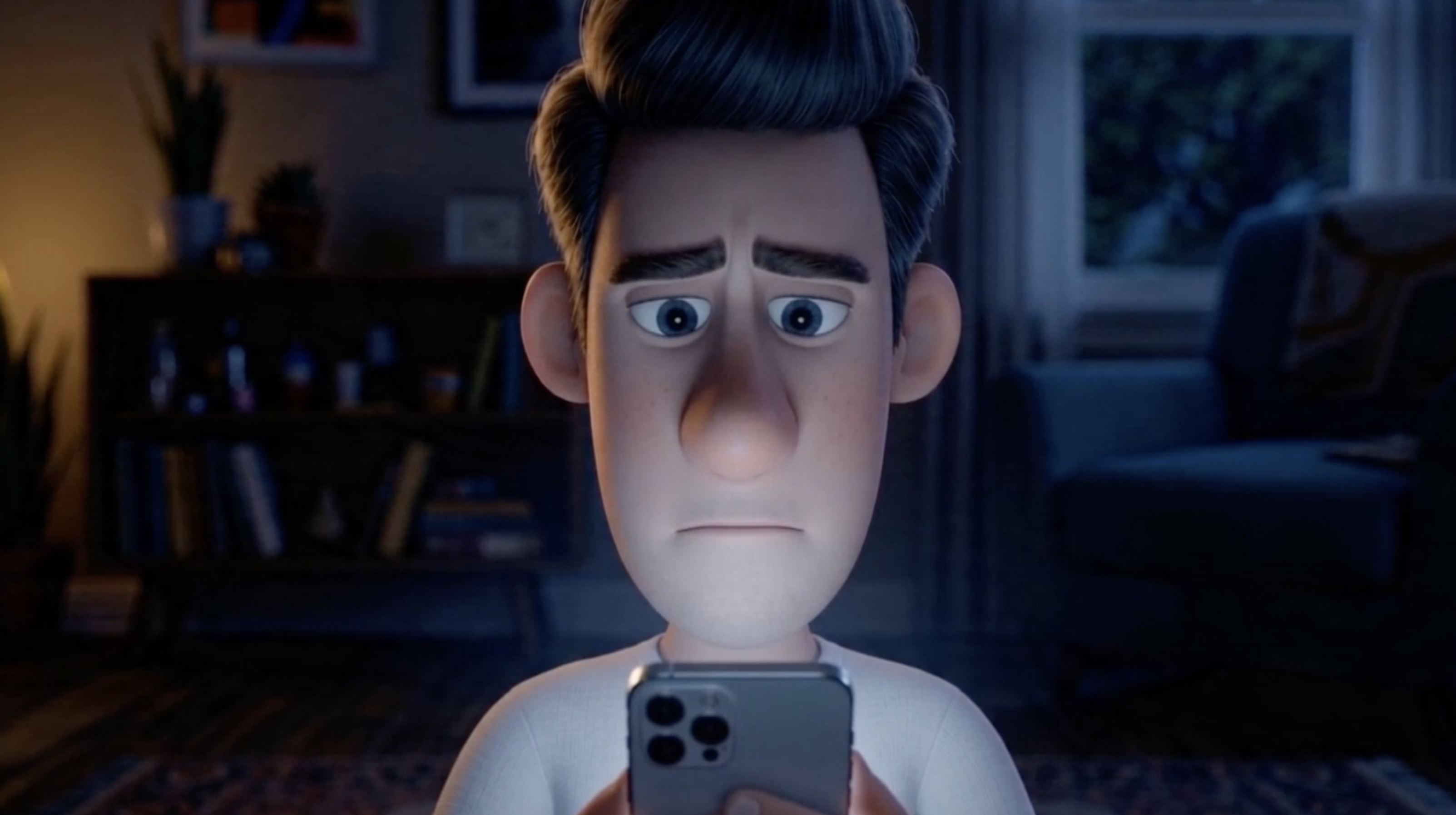 Lucas, lit by his phone in the dark